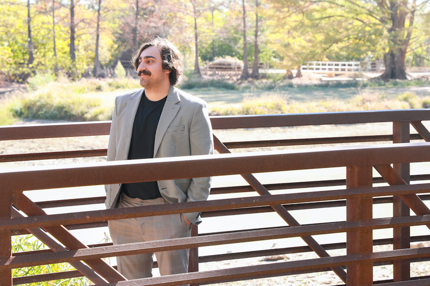 Joshua Kindla standing on a bridge